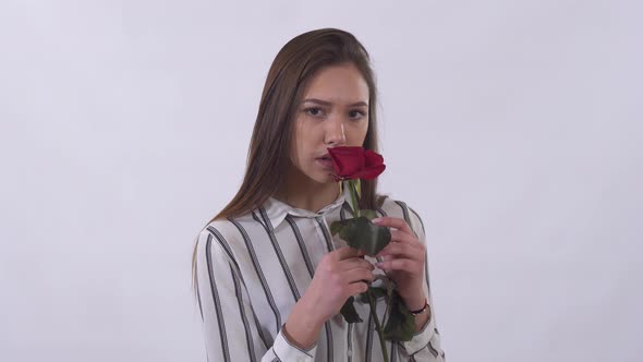 Portrait Sad Young Woman, Tearing Off Petals of Rose