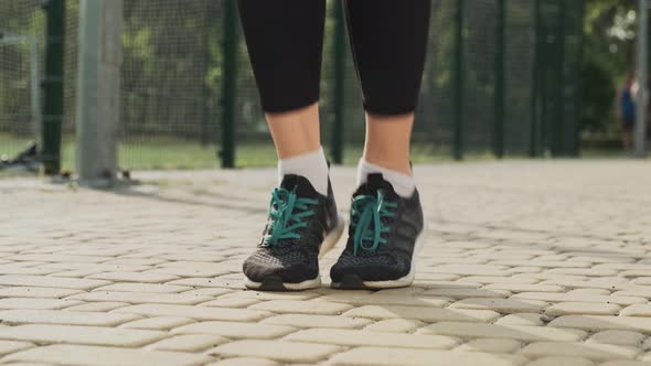 Close Up of Female Feet Jumping Rope
