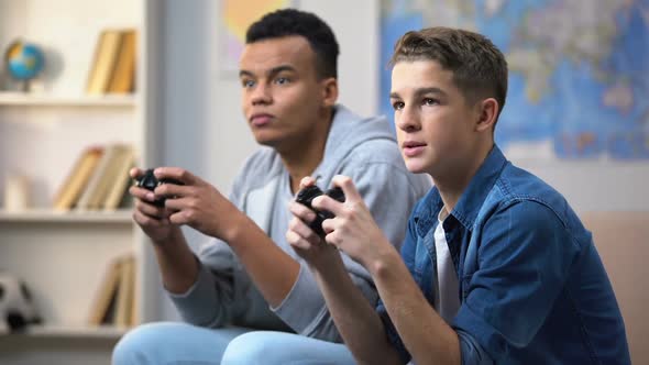 African-American and European Teenagers Playing Video Games, Gaming Addiction