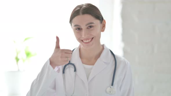 Portrait of Woman showing Thumbs Up Sign