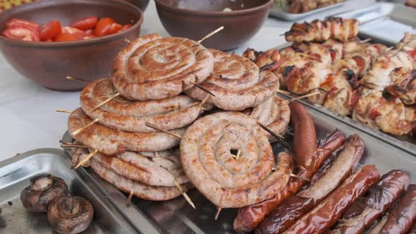 Ready-to-Eat Grilled Meat in a Street Food Shop Window. Ready-made Food on Party