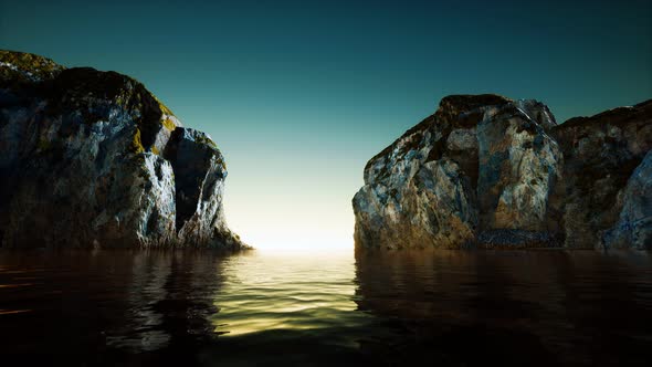 Rocky Cliff at Cold Sea Water