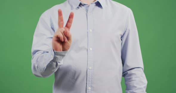 Man showing victory sign