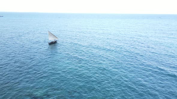 Aerial View of a Boat in the Ocean Near the Coast of Zanzibar Tanzania