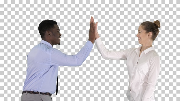 Young woman and young man in formal clothes give high five