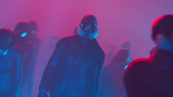The animation of people in masks walking in dark. A man marching in a  crowd.