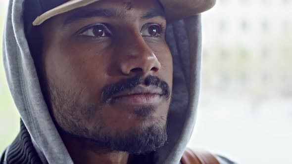 Arab Man Covering Camera with Hand