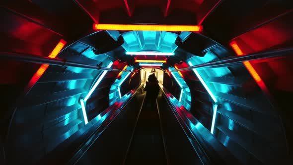 An Escalator in the Tunnel with Flashing Lights