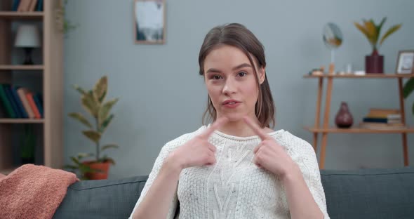 Crop View of Young Woman Showing with Deaf-mute Sign Language I Love Life. Beautiful Female Person