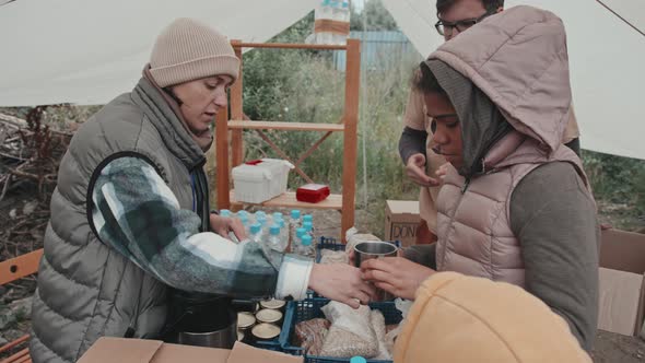 Social Workers Helping People at Refugee Camp