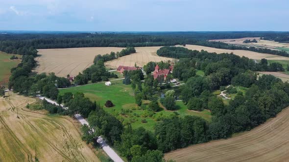 Jaunmoku Brick Medieval Castle Near Tukums, Latvia  Aerial Dron 4k Shot Jaunmokas Manor Park.