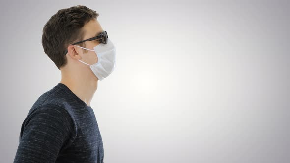 Blind Man in Black Glasses Walking on Gradient Background