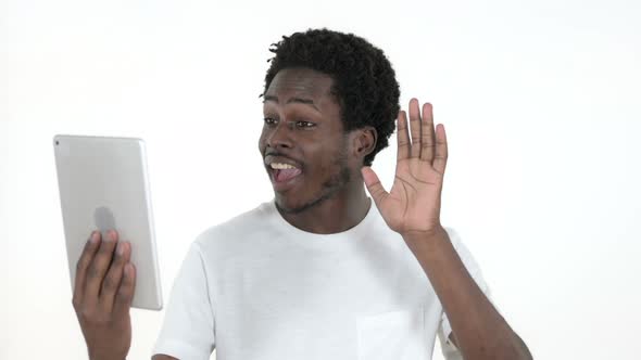 Online Video Chat By African Man Via Tablet, White Background