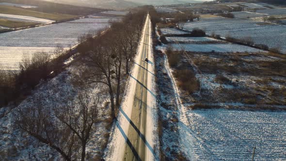 Long And Lonely Road At Sunset