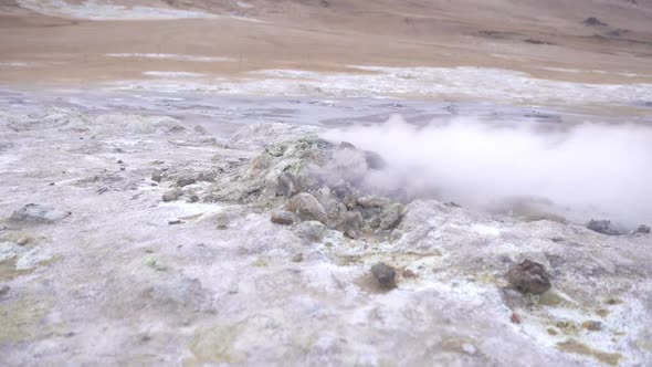 Steaming fumarole in rocky area
