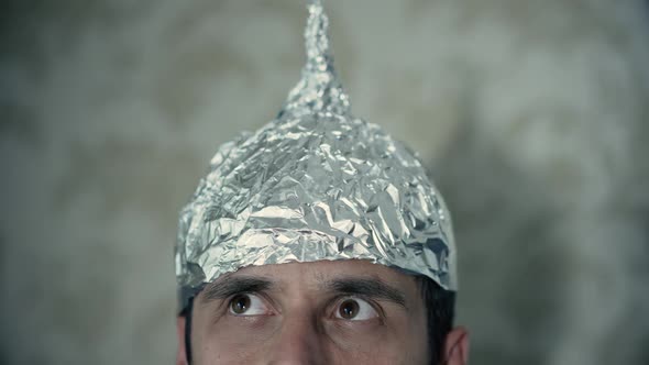 Man Wearing Tin Foil Hat