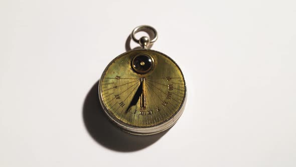 Solar Vintage Clock. White Background. Close Up