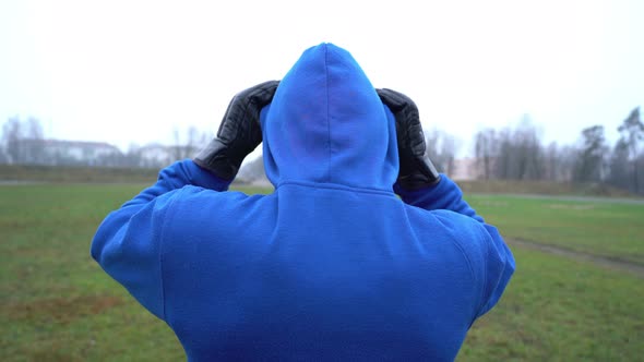 Man Take Off Hood Rear View Looking Aggressive, Trying To Provoke Someone for Fight, Anger Managment