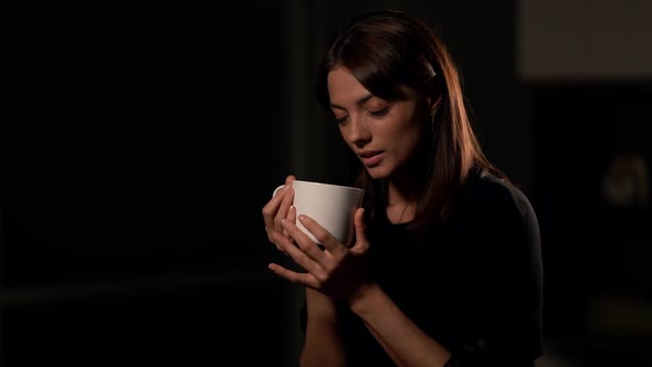 Charming Lady with Big Teacup in Studio, Interlocutor for Interview, Smiling Young Woman