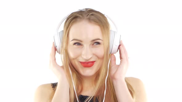 Beauty Woman Listening Music in Headphone