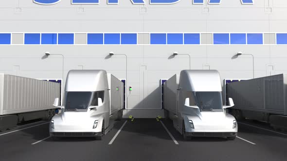 Electric Trucks at Warehouse Dock with PRODUCT OF SERBIA Text alt