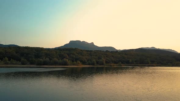 View of lake with forest