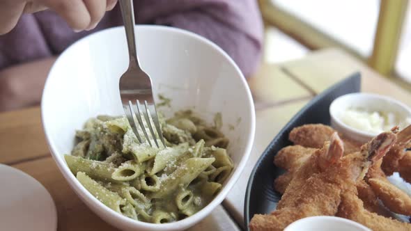 Cooked Pasta with Pesto in a Bowl