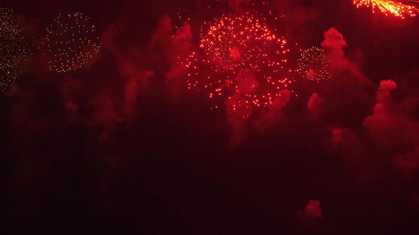 Festive Fireworks in Night Sky of Big City