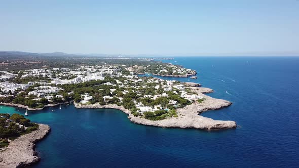 Aerial: Cala D'Or resort town in Mallorca, Spain