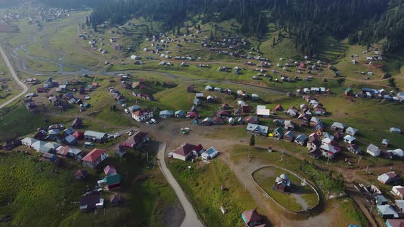 Misty Aerial View Of High Mountain Village