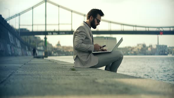 Man Sitting And Typing On Laptop. Businessman Remote Working In Internet Distance Job.