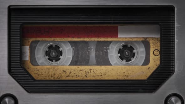 Vintage Audio Cassette Rotates in Old Tape Recorder