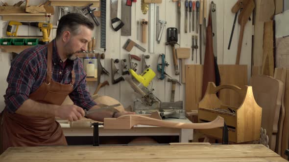 Cabinet Maker Begins his Working Day