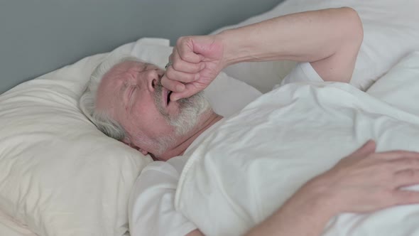 Old Man with Cough Laying in Bed 