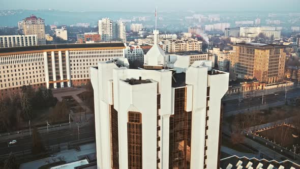 Aerial drone view of Chisinau downtown. View of Parliament and Presidency, roads with moving cars an