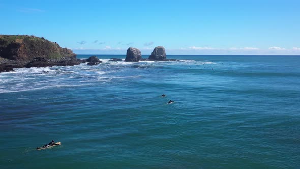 surfing in punta de lobos chile sunny day incredible landscape recorded with drone
