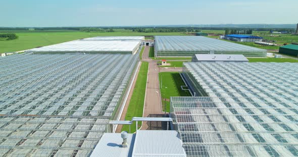 Flying Over Large Greenhouses