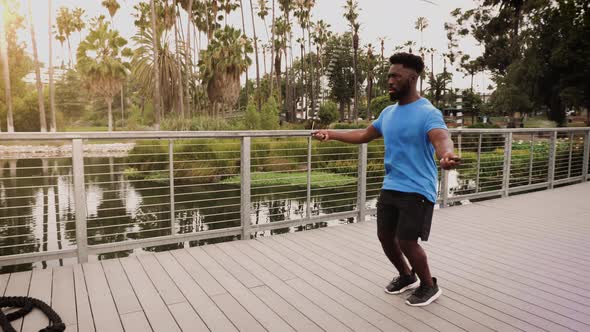 Athlete man working out in the park