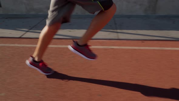 Boy Running On School Track