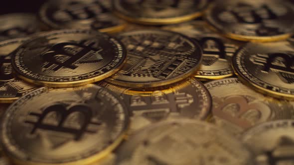 Pile of Gold Bitcoin Coins Closeup