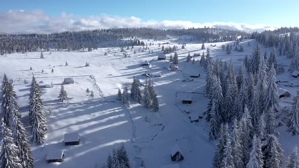 Mountain Village Buried Under Snow at Winter