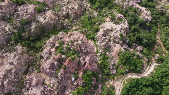 Aerial top down red rock quarry mining