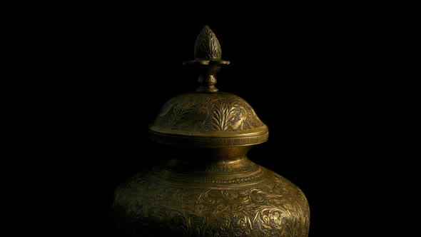 Passing Antique Gold Container On Black alt