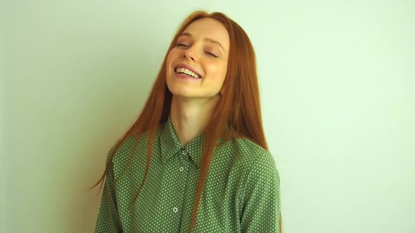 Redhaired Ginger Woman in Green Cotton Tshirt Loving Her Hairs and Feeling Confidence