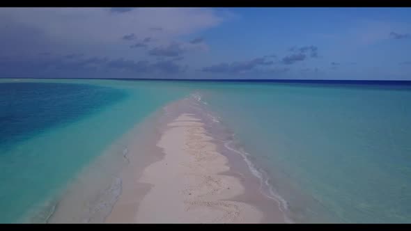Aerial nature of luxury resort beach journey by blue water with white sandy background of journey ne