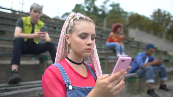 High School Student Scrolling Social Networks Photo Holding Smartphone Addiction