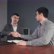 Men Making Agreement at Table in Office - VideoHive Item for Sale