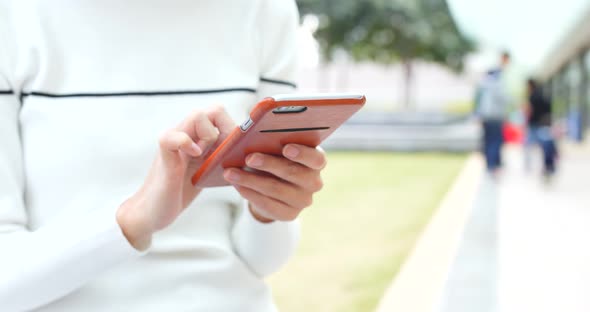 Woman Use of Cellphone at Outdoor