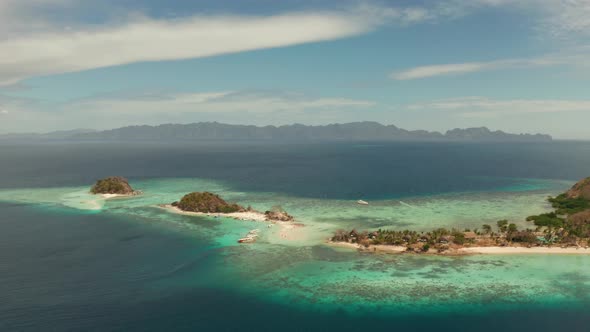 Small Torpic Island with a White Sandy Beach Top View