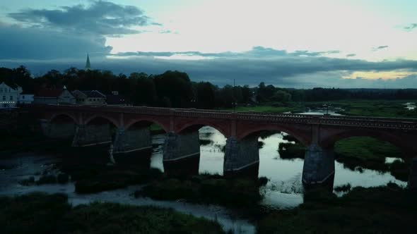 Widest Waterfall in Europe in Latvia Kuldiga and Brick Bridge Across the River Venta 